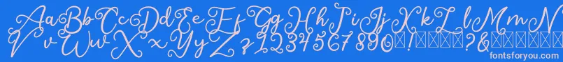SalaheFree-Schriftart – Rosa Schriften auf blauem Hintergrund