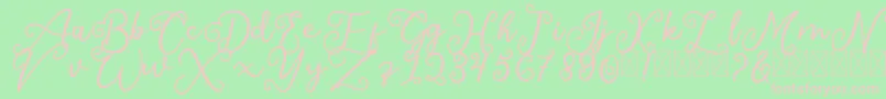 SalaheFree-Schriftart – Rosa Schriften auf grünem Hintergrund