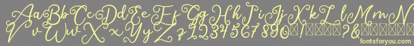 SalaheFree-Schriftart – Gelbe Schriften auf grauem Hintergrund
