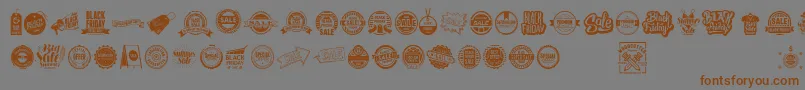 フォントSale – 茶色の文字が灰色の背景にあります。