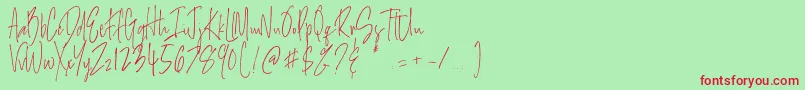 フォントSalernitana Script – 赤い文字の緑の背景