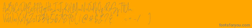 Salernitana Script-Schriftart – Graue Schriften auf orangefarbenem Hintergrund