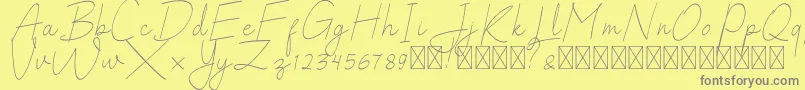 SalhenaFree-Schriftart – Graue Schriften auf gelbem Hintergrund