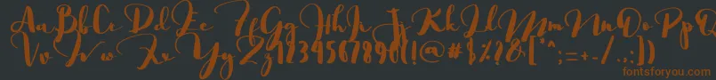 Saligra-fontti – ruskeat fontit mustalla taustalla