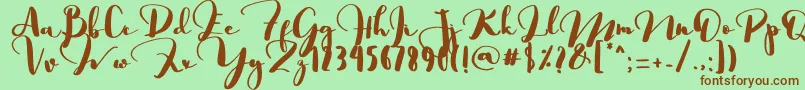 フォントSaligra – 緑の背景に茶色のフォント