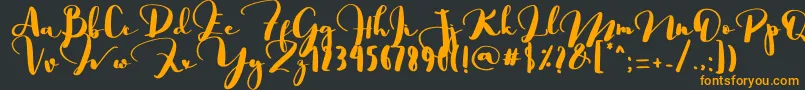Saligra-Schriftart – Orangefarbene Schriften auf schwarzem Hintergrund