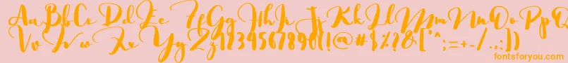 フォントSaligra – オレンジの文字がピンクの背景にあります。
