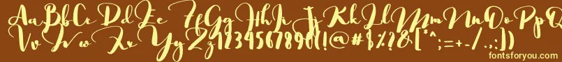 Saligra-Schriftart – Gelbe Schriften auf braunem Hintergrund