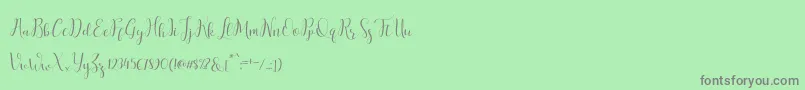 salitascript Font – Gray Fonts on Green Background