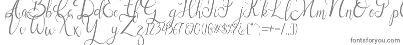 フォントSallisa – 白い背景に灰色の文字