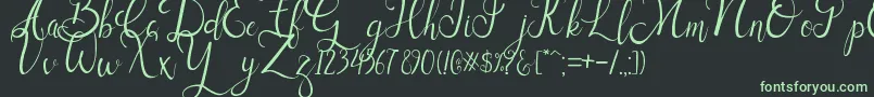 フォントSallisa – 黒い背景に緑の文字