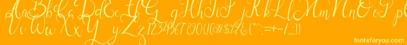Czcionka Sallisa – żółte czcionki na pomarańczowym tle