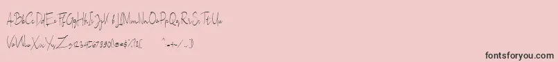 フォントSallita Free Version – ピンクの背景に黒い文字