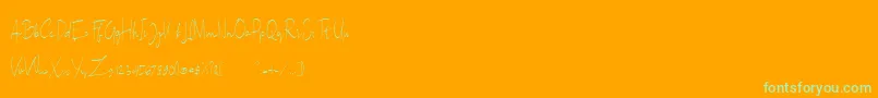 フォントSallita Free Version – オレンジの背景に緑のフォント