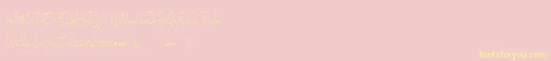 フォントSallita Free Version – 黄色のフォント、ピンクの背景