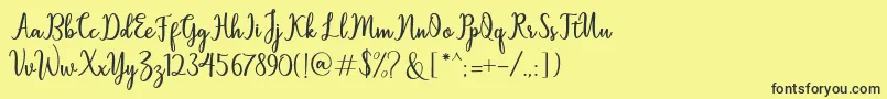 フォントSallita – 黒い文字の黄色い背景