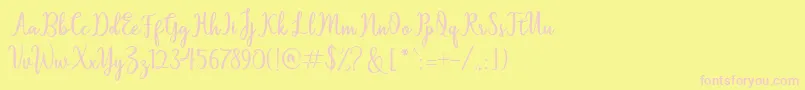 Czcionka Sallita – różowe czcionki na żółtym tle