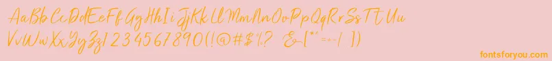 Salty Malthy Font – Orange Fonts on Pink Background