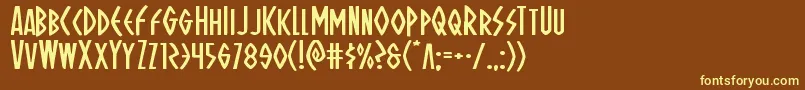 Ohmightyisisexpand-fontti – keltaiset fontit ruskealla taustalla