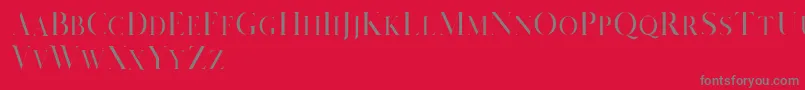 フォントSalvalyn Demo – 赤い背景に灰色の文字
