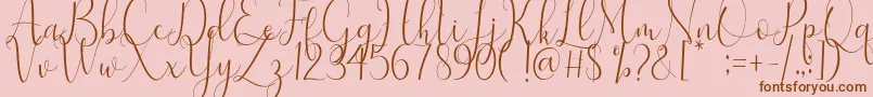 Samantha-Schriftart – Braune Schriften auf rosa Hintergrund