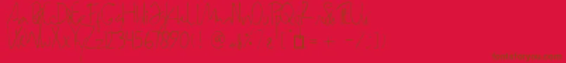 Fonte SamarasaHandwriting – fontes marrons em um fundo vermelho