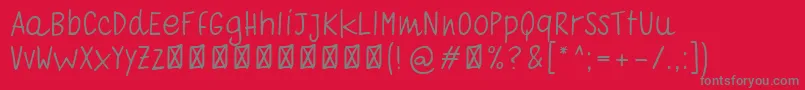 QuadernoBiancoRegular-Schriftart – Graue Schriften auf rotem Hintergrund