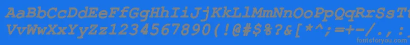 Czcionka ErKurierKoi8BoldItalic – szare czcionki na niebieskim tle