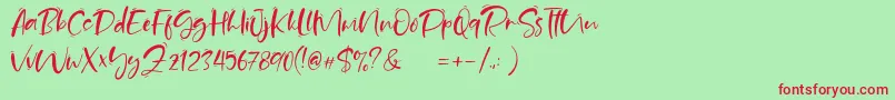 Sand Beach Demo-Schriftart – Rote Schriften auf grünem Hintergrund