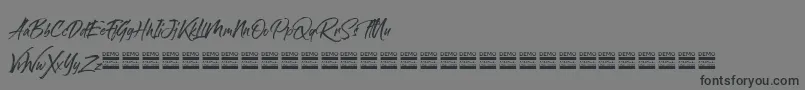 sandbrush demo-Schriftart – Schwarze Schriften auf grauem Hintergrund