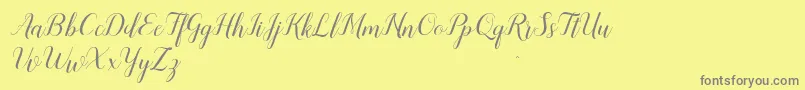 Weitere Informationen zur Sandhya-Schriftart Sandhya-Schriftart – Graue Schriften auf gelbem Hintergrund