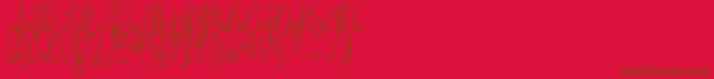 フォントSandle – 赤い背景に茶色の文字