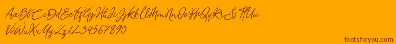 Шрифт Sandra Belhock Italic – коричневые шрифты на оранжевом фоне