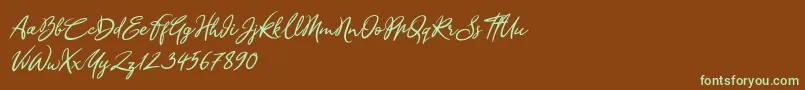 フォントSandra Belhock Italic – 緑色の文字が茶色の背景にあります。