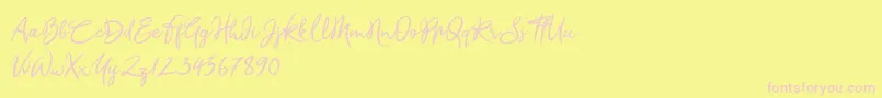 Czcionka Sandra Belhock – różowe czcionki na żółtym tle