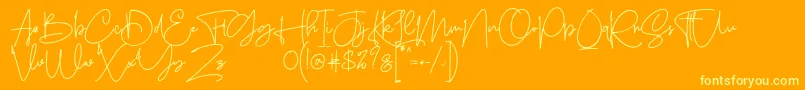 Sanpaullo-Schriftart – Gelbe Schriften auf orangefarbenem Hintergrund