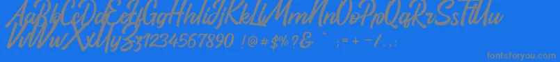 Santun Adab-Schriftart – Graue Schriften auf blauem Hintergrund