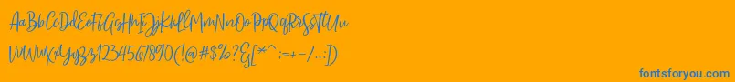 Sarmilla Script-Schriftart – Blaue Schriften auf orangefarbenem Hintergrund