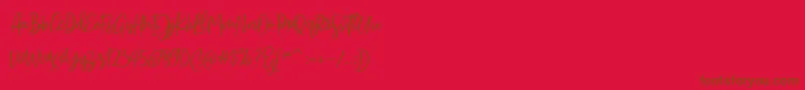 Sarmilla Script Font – Brown Fonts on Red Background
