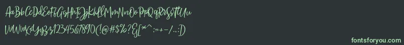 Sarmilla Script Font – Green Fonts on Black Background