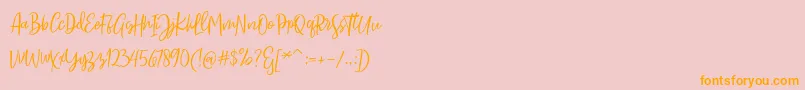 Sarmilla Script Font – Orange Fonts on Pink Background