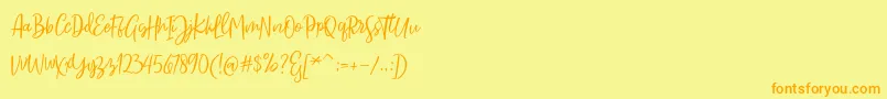 Sarmilla Script Font – Orange Fonts on Yellow Background