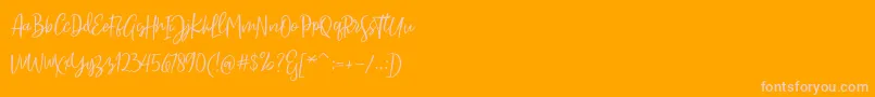 Fonte Sarmilla Script – fontes rosa em um fundo laranja