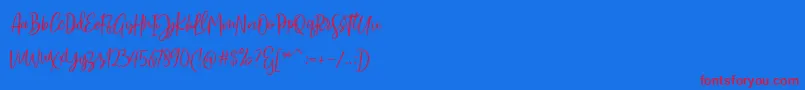 Sarmilla Script-Schriftart – Rote Schriften auf blauem Hintergrund