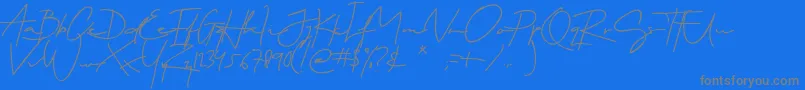 Sartono-Schriftart – Graue Schriften auf blauem Hintergrund