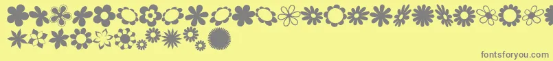 Lisätietoja sarusFlowerDingsRB-fontista sarusFlowerDingsRB-fontti – harmaat kirjasimet keltaisella taustalla