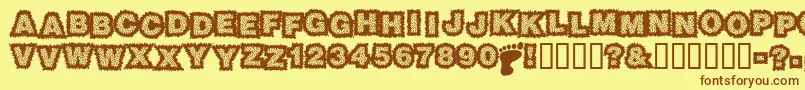 フォントSasquatch – 茶色の文字が黄色の背景にあります。