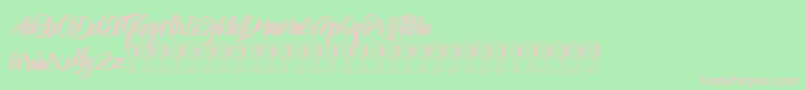 Satarland Font – Pink Fonts on Green Background