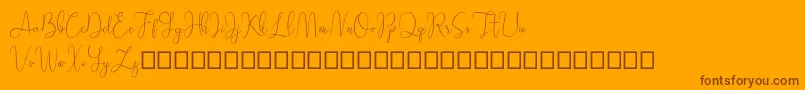 Sathien demo-Schriftart – Braune Schriften auf orangefarbenem Hintergrund