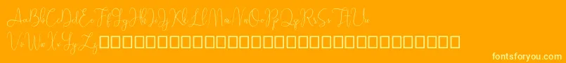 Sathien demo-fontti – keltaiset fontit oranssilla taustalla